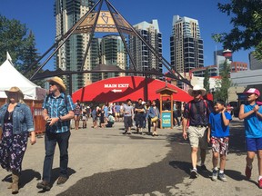 Attendees hit the grounds at the Calgary Stampede on July 7, 2018.