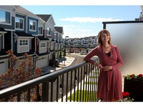 Sunday Wihnon loves her new townhome at Carnaby Heights by Jayman Built in Nolan Hill.