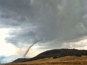 A tornado south of Fairplay, Colo., Thursday, July 5, 2018. The National Weather Service says the twister touched down Thursday in Park County, south of Fairplay, a central Colorado town about 10,000 feet (3,000 meters) above sea level.