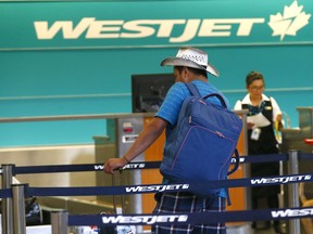 WestJet reports $20.8 million during its second quarter do to labour troubles, high fuel costs and competition in Calgary on Tuesday July 31, 2018. Darren Makowichuk/Postmedia