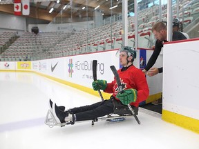Humboldt Broncos crash survivor Ryan Straschnitzki takes to the ice at Winsport to learn how to play sledge hockey in Calgary
