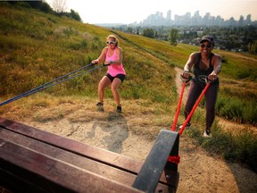Personal trainer Leslie Roland, left helps Jackie Pearson stay fit in Calgary.