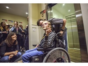 Clare Jackson, 9, rides the elevator for the very first time in her brand new accessible home.