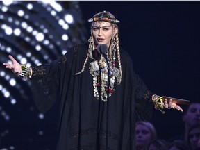 Madonna presents a tribute to Aretha Franklin at the MTV Video Music Awards at Radio City Music Hall on Monday, Aug. 20, 2018, in New York.