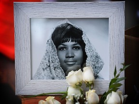 Flowers and tributes are placed on the Star for Aretha Franklin on the Hollywood Walk of Fame in Hollywood, Calif., Aug. 16, 2018.  The "Queen of Soul" died at home in Detroit from advanced pancreatic cancer.