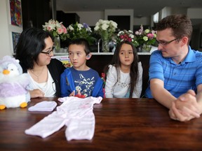 Tom Kmiec, Conservative MP for Calgary Shepard, and wife Evangeline with their two eldest children Maximillian, 10 and Jolie, 7 at their home in Calgary, on Monday August 27, 2018, talk about their baby girl Lucy Rose, who had Trisomy 13 died on August 13 after just 39 days of life. Leah Hennel/Postmedia