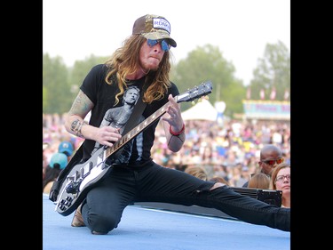 Jaren Johnston from the southern rock band The Cadillac Three, performs at the 3rd annual Country Thunder music festival held at Prairie Winds Park in northeast Calgary Friday, August 17, 2018. Dean Pilling/Postmedia