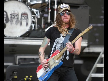 Jaren Johnston from the southern rock band The Cadillac Three, performs at the 3rd annual Country Thunder music festival held at Prairie Winds Park in northeast Calgary Friday, August 17, 2018. Dean Pilling/Postmedia