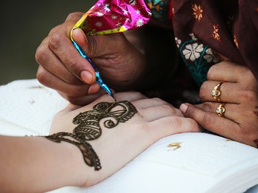 Henna painting at Globalfest on Tuesday, August 21, 2018. The Philippines put on the show fireworks show for the night.