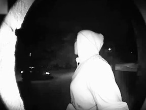 A woman is seen before an apparent abduction in surveillance video in Richmond Hill on Thursday, Aug. 23, 2018.