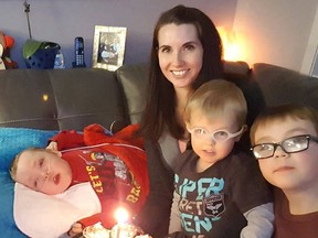Melissa Huitema and her sons Cade (5), left to right, Kean (3) and Kai (7) are seen in this undated handout photo. The mother of a terminally ill Calgary boy who requires around-the-clock care says she is being hassled by neighbours over street parking. Melissa Huitema has a team of nurses and other professionals who take care of five-year-old Cade at home. She, her husband and three boys live on a suburban street where the single-family homes are spaced tightly together.