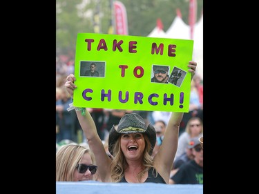 An Eric Church fan raises her sign during day three of the 3rd annual Country Thunder music festival held at Prairie Winds Park in northeast Calgary Sunday, August 19, 2018. Dean Pilling/Postmedia