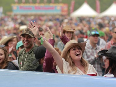 Music fans cheer as Dean Brody performs on day two of the 3rd annual Country Thunder music festival held at Prairie Winds Park in northeast Calgary Saturday, August 18, 2018. Dean Pilling/Postmedia