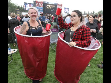 Toby Keith fans Heather Moore and Allysa Lougheed dressed up as red solo cups for day two of the 3rd annual Country Thunder music festival held at Prairie Winds Park in northeast Calgary Saturday, August 18, 2018. Dean Pilling/Postmedia