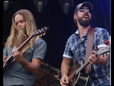 Drew Gregory (R) performs at the 3rd annual Country Thunder music festival held at Prairie Winds Park in northeast Calgary Friday, August 17, 2018. Dean Pilling/Postmedia