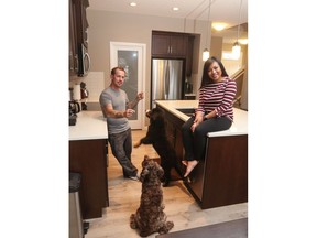 Eileen Tria and Dusten Schneider love the spaciousness of their new home, with their pooches Cooper and Vada.