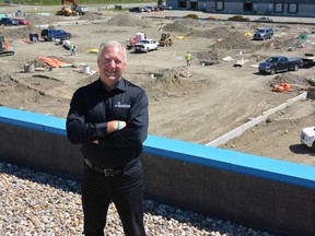 Frank Weiss, executive director of Samaritan's Purse, overlooking construction of new warehouse facility for its Disaster Response Units, adjacent to its current building in the northeast. Supplied photo, for David Parker column. July 2018