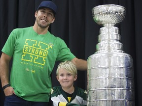 Washington Capitals left wing Chandler Stephenson interacts with a young fan during the Humboldt Hockey Day event in Humboldt, Sask., Friday, August 24, 2018.
