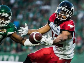 Calgary Stampeders wide receiver Juwan Brescacin (82) reaches for a pass during second half CFL action against the Saskatchewan Roughriders, in Regina on Sunday, August 19, 2018. The Saskatchewan Roughriders defeated the Calgary Stampeders 40-27. THE CANADIAN PRESS/Matt Smith ORG XMIT: MBS117