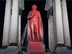 Nov. 12, 2017: A statue of Sir John A. Macdonald is shown covered in red paint in Montreal. The same statue has been hit again on Friday, Aug. 17, 2018.