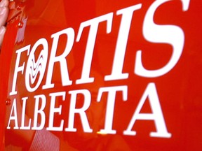 Fortis Alberta's company logo is unveiled on the STARS helicopter.