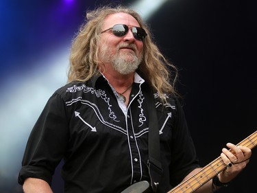 Doug Phelps, bassist and vocalist with the Kentucky Headhunters, performs during day three of the 3rd annual Country Thunder music festival held at Prairie Winds Park in northeast Calgary Sunday, August 19, 2018. Dean Pilling/Postmedia