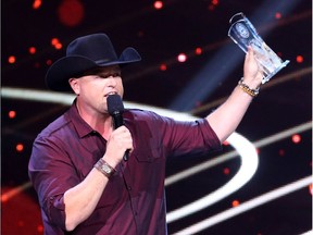 Gord Bamford is kicking off his new Honkytonks & Dive Bars tour in Calgary. Here he accepts the award for album of the year at the 2016 Canadian Country Music Association Awards.