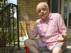 Robert Williams of Seeley Drive in London, Ont. was one of 35 residents of the street that were told they would lose mail delivery if they did not address certain health and safety concerns. For most it was a lack of railings but for Williams his top stair is roughly 2 inches taller than the 8-1/4 inches that is code, so Williams bought an old fashioned mailbox and placed it on a lower step. But the letter carrier ignored the box and placed the mail in the regular slot. (Mike Hensen/The London Free Press)