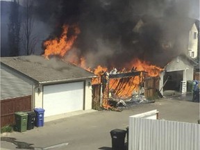 Crews were called to a garage fire in the southwest community of Silverado on Tuesday. Facebook footage captured by a witness shows a garage engulfed in flames.