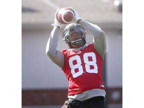 Calgary Stampeders SB Kamar Jorden reels in a catch during practice at McMahon Stadium on Friday. Photo by Darren Makowichuk/Postmedia.