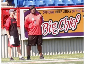 Calgary Stampeders Defensive Coordinator, DeVone Claybrooks was back at practice after health issues at McMahon stadium in Calgary on Friday. Photo by Darren Makowichuk/Postmedia