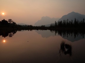 Vermilion Lakes, Banff National Park is shown during a sunrise photo tour in this recent photo. Smoke from wildfires that's blanketing parts of Alberta does more than just irritate the eyes and throats of visitors to the province's mountain parks -- it obscures the spectacular scenery that many have travelled thousands of kilometres to see.