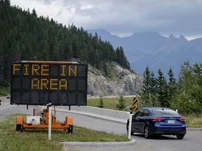 A sign near Banff warns of a forest fire in the area last summer. Banff National Park is once again under a fire ban.