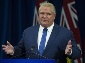 Premier Doug Ford holds a press conference arguing against the judges ruling about slashing the size of City council in Toronto, Ont. on Monday September 10, 2018.