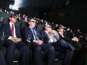 Movie-goers take in the 4DX experience at Cineplex Cinemas in Toronto on Nov. 3, 2016.