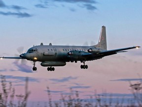 A photo taken on July 23, 2006 shows an Russian IL-20M plane landing at an unknown location. Russia blamed Israel on September 18, 2018 for the loss of a similar IL-20M jet to Syrian fire, which killed all 15 servicemen on board, and threatened a response.