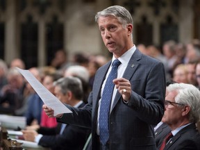 Parliamentary Secretary to the Minister of Foreign Affairs Andrew Leslie reads a motion calling on the government to recognize the actions in Myanmar as genocide following Question Period in the House of Commons Thursday September 20, 2018 in Ottawa. The House of Commons adopted the motion unanimously.