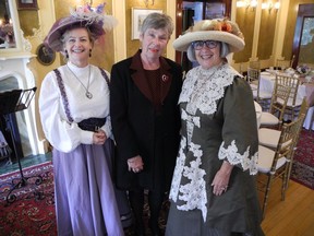Pictured from left at the  Lady Grey Tea at Lougheed House are: Lougheed House executive director Kirstin Evenden, historian Patricia Roome and Trudy Cowan, founding executive director of the Lougheed House Conservation Society.