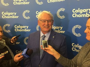 Former B.C. premier Gordon Campbell speaks to a Calgary Chamber of Commerce luncheon on Calgary's potential Olympic bid.