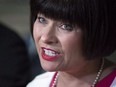 Federal Health Minister Ginette Petitpas Taylor talks with reporters after addressing the Canadian Public Health Association's annual Public Health conference in Montreal on Thursday, May 31, 2018.
