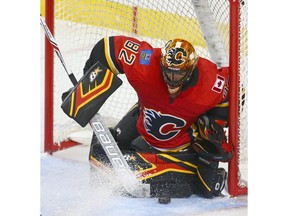 Flames goaltending prospect Tyler Parsons makes a save during an NHL pre-season rookie game between the Edmonton Oilers and Calgary Flames in Calgary on Sunday, September 9, 2018. Jim Wells/Postmedia
