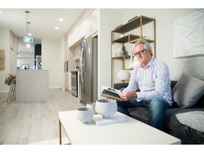 Richard Faust in the show suite for the Q Condominiums in Sage Hill Quarter.