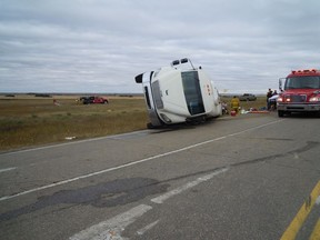 Saskatchewan RCMP distributed photos of the scene where a bus carrying pipeline workers collided with a truck on Sept. 14, 2018, near Kerrobert. Of the 16 people on the converted school bus, pictured, 10 were injured.