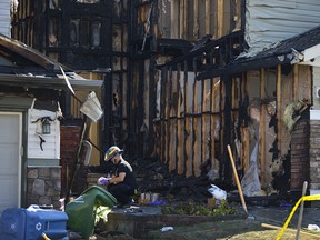Arson investigator at the scene of a suspicious two-alarm fire in Panorama Hills on Wednesday, Sept. 5, 2018.