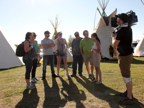 Participants in APTN's reality show First Contact are shown in a handout photo. The new television show explores what happens when you bring six outspoken Canadians into Indigenous homes and communities.
