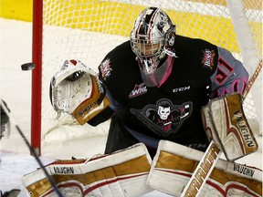 Goalie Nick Schneider saw a ton of action last season with the WHL's Calgary Hitmen. Next week, he's off to China with the Flames. Postmedia file photo