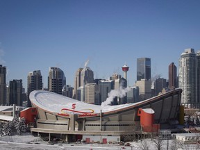 Steam rises from buildings near the Scotiabank Saddledome in Calgary.