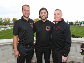 Cavalry FC head coach and GM Tommy Wheeldon Jr, (C) poses with Jordan Santiago (L), the newly named goalkeeper coach and Martin Nash (L), the newly named assistant coach and technical director during a press conference at Spruce Meadows in Calgary on  Tuesday, September 18, 2018. Calgary FC will begin play in the newly formed CPL in the spring in Calgary. Jim Wells/Postmedia