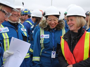 Premier Rachel Notley talks to officials and workers at the Long Lake South West Site south of Fort McMurray, Alta. on Tuesday, Sept. 11, 2018.