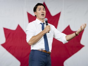 Prime Minister Justin Trudeau addresses a town hall meeting in Saskatoon on Sept. 13, 2018.